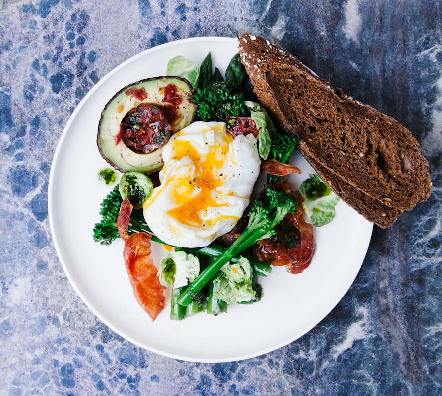 Healthy balanced meal plate with vegetables and proteins